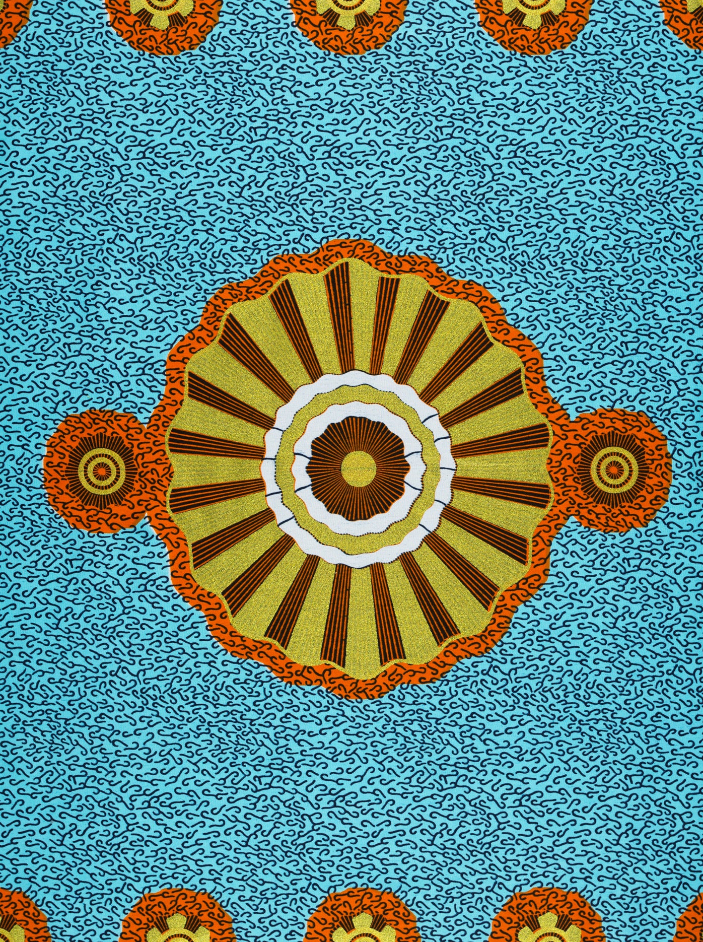 Colorful patterned Wax Hollandais fabric in lime green, ideal for vibrant African fabric designs