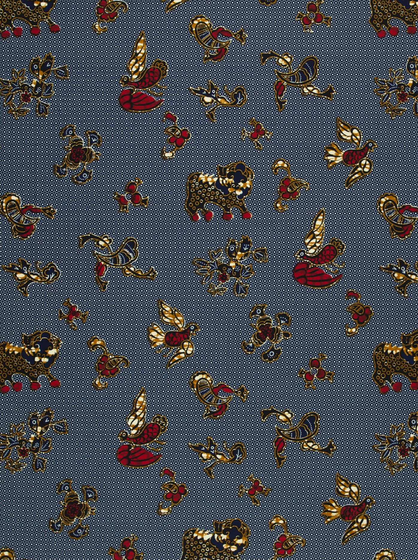 Patterned Wax Hollandais fabric with intricate animal motifs for vibrant African designs