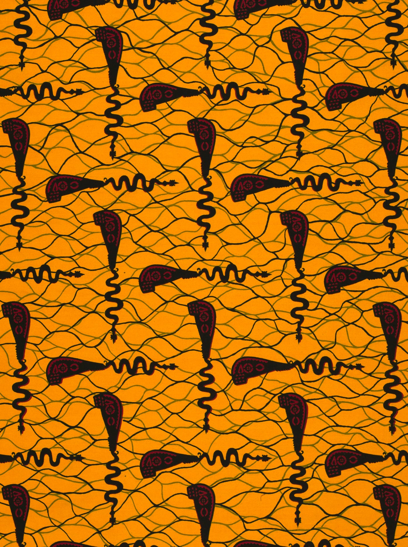 Orange Wax Hollandais fabric featuring dark brown abstract patterns, perfect for textiles