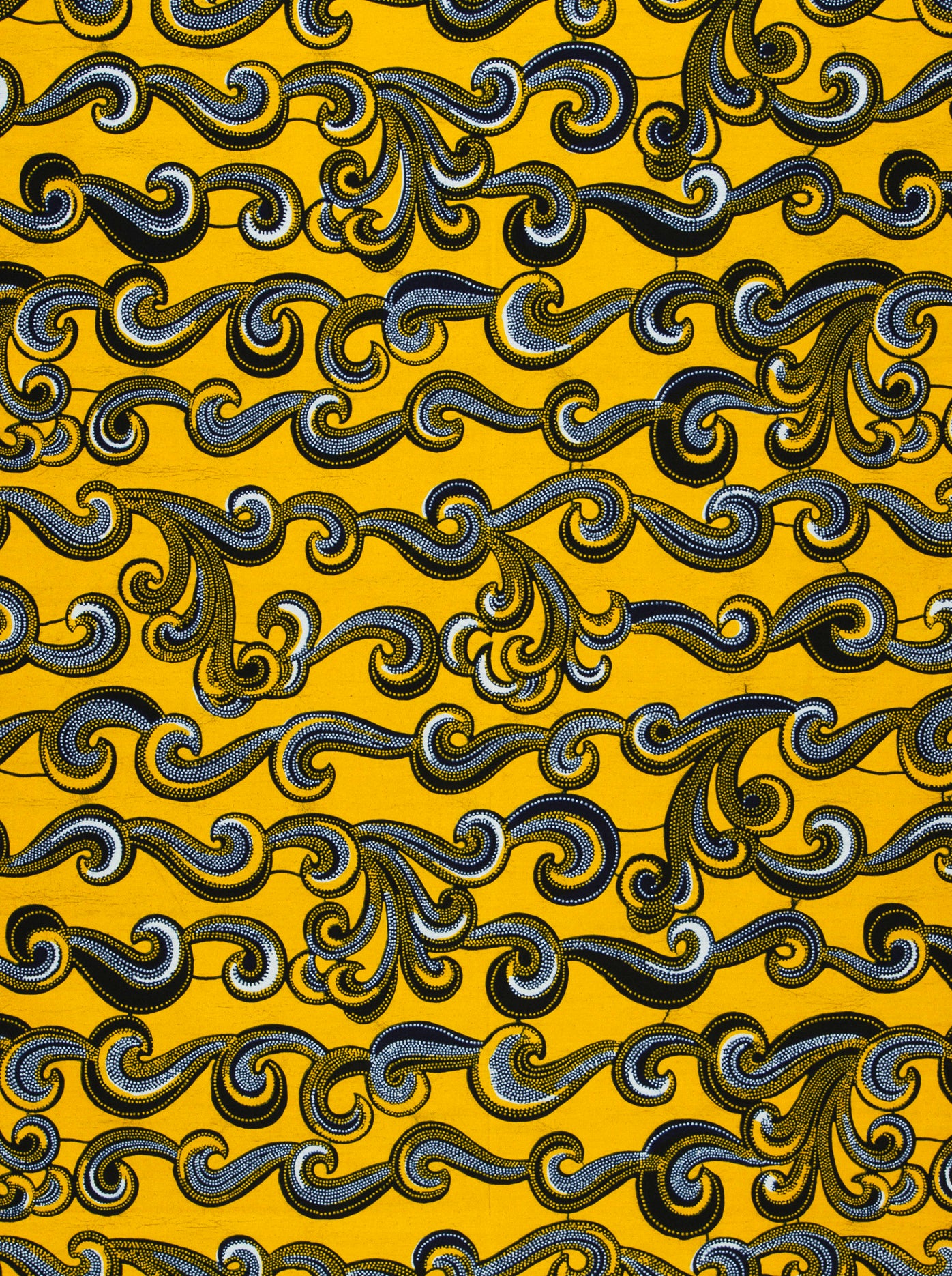 Yellow Wax Hollandais fabric with swirling patterns, ideal for African fabric projects